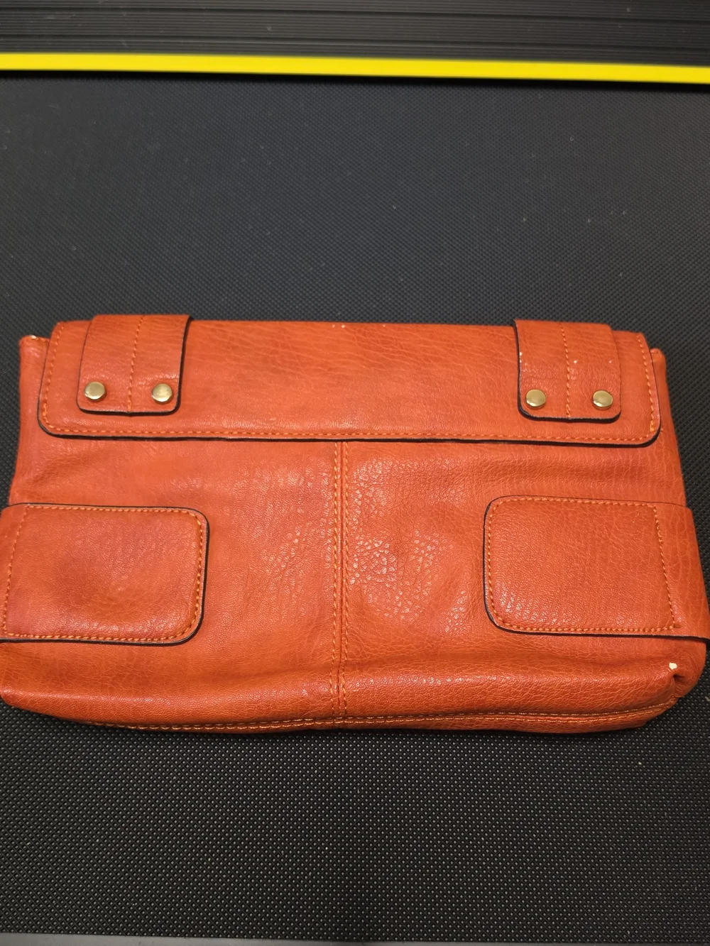 Poppie Jones Orange Leather Fold-Over Clutch with Brass Accents